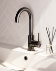 Basin tap, surface-mounted, curved spout - gunmetal